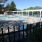 a swimming pool with a fence around it