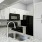 a kitchen with white cabinets