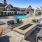 a pool with lounge chairs
